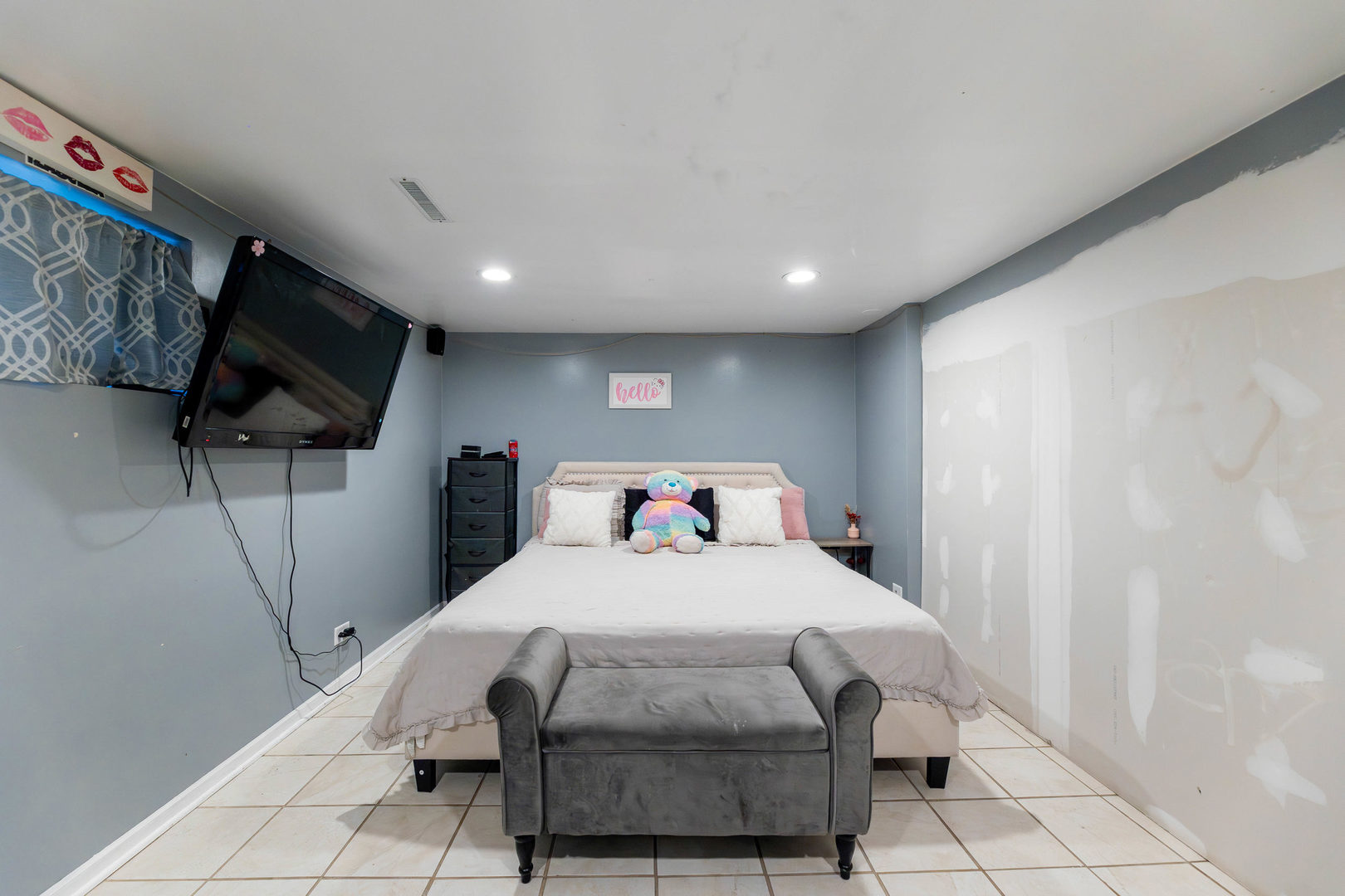 4147 Gage Avenue Lyons, IL 60534 - Photo 24 of 33 a bedroom with a bed and a flat screen tv