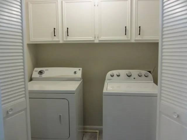 a view of washer and dryer with washer and dryer
