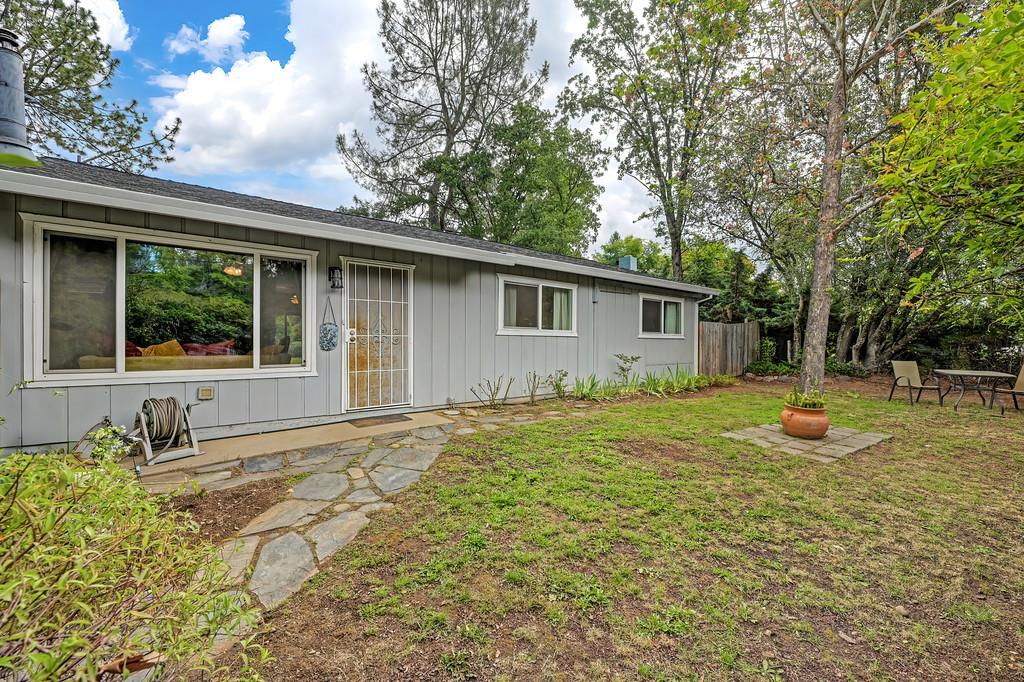 6689 Rhodes Avenue Placerville, CA 95667 - Photo 9 of 60 a view of a backyard with a garden and plants