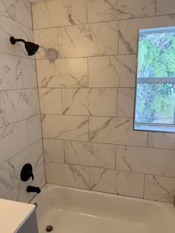 a bathroom with a bathtub