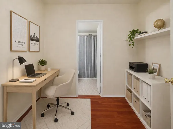 a workspace with furniture and window