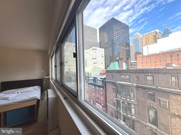 a view of a balcony with city view