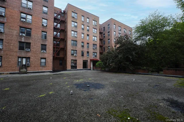 a view of a building with a street
