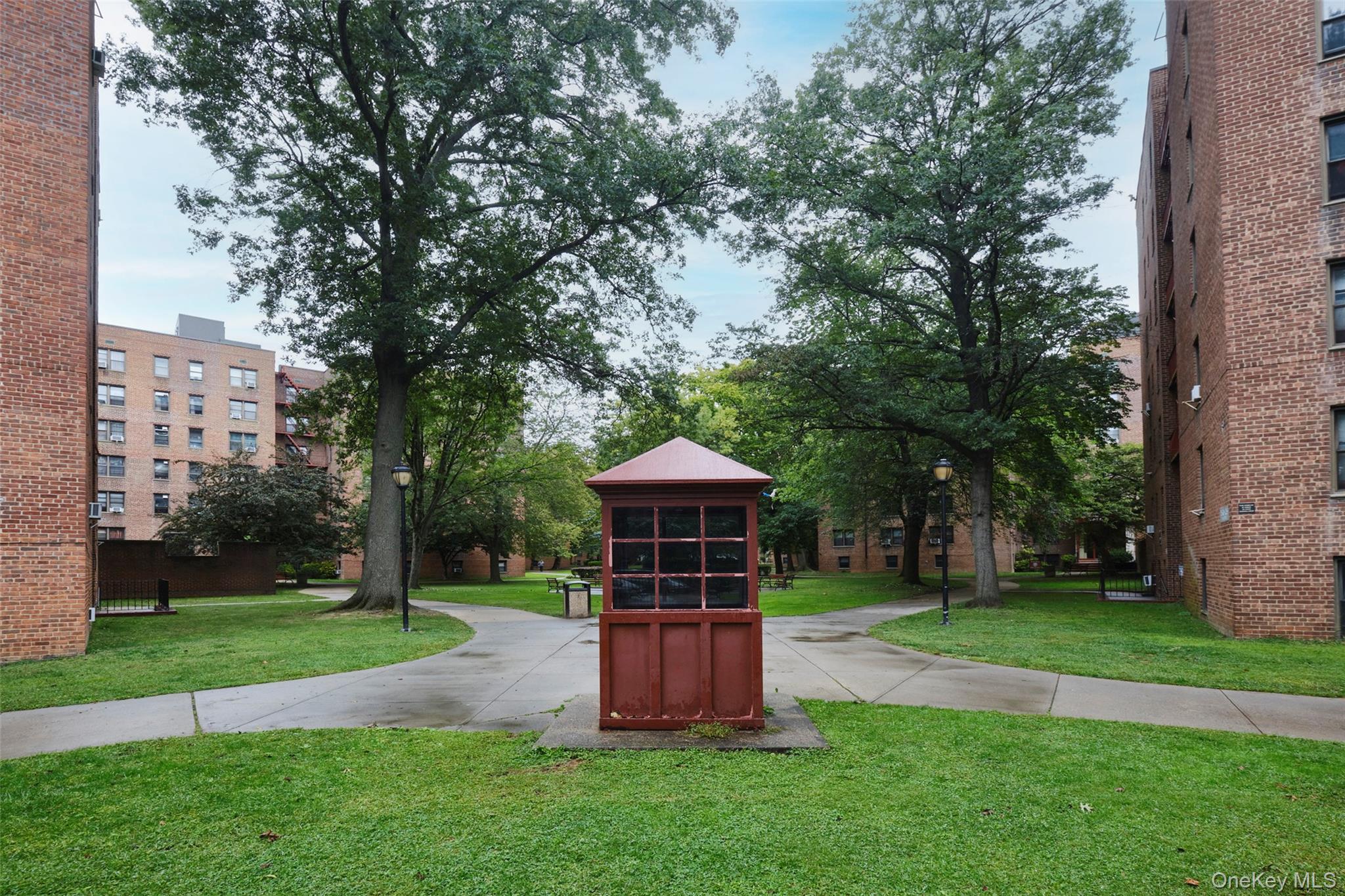 150-11 72nd Road, Unit 1C Queens, NY 11367 - Photo 20 of 25 Surrounding community with a yard