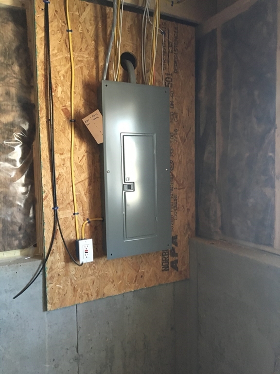 248 Holtshire Road, Unit LOT 2 Orange, MA 01364 - Photo 11 of 12 a view of a livingroom with wooden floor and a staircase