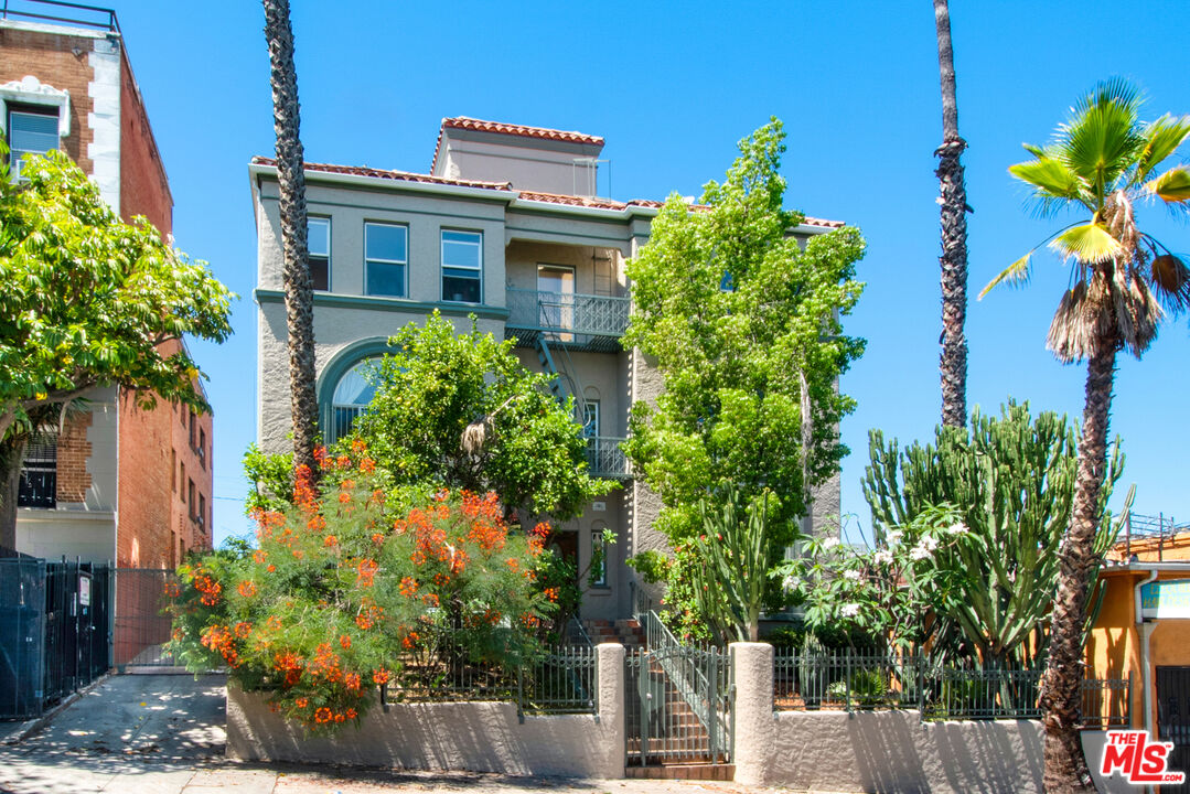 a plant that is in front of a house