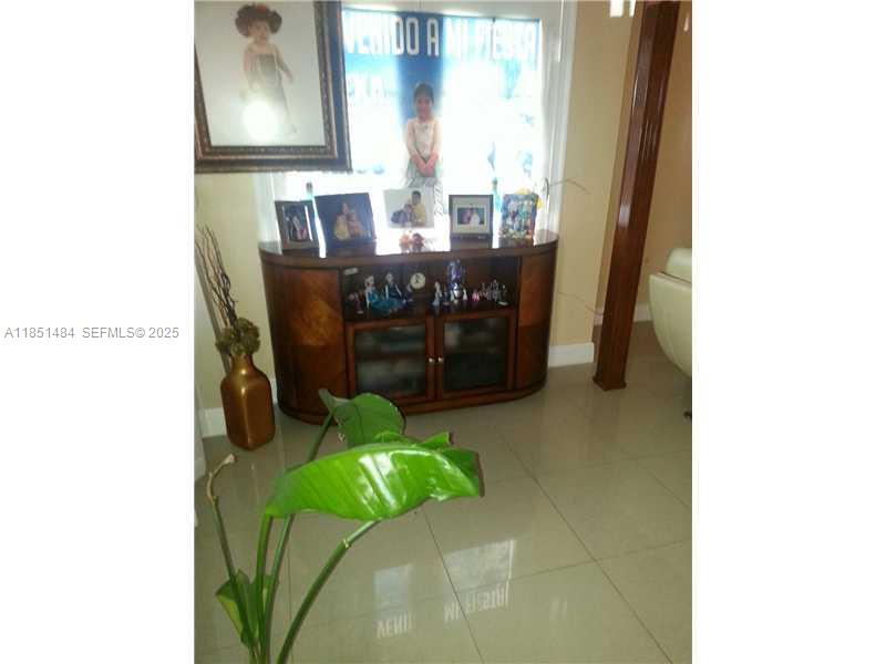 321 Northwest 13th Avenue Miami, FL 33125 - Photo 2 of 13 a view of a porch with furniture