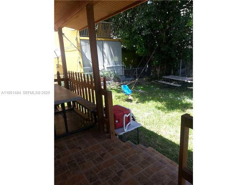 321 Northwest 13th Avenue Miami, FL 33125 - Photo 7 of 13 a view of yard from balcony