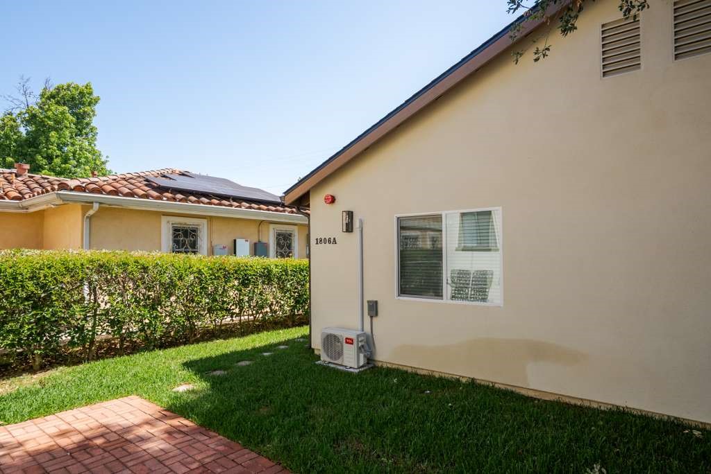 1806 South 8th Street, Unit B Alhambra, CA 91803 - Photo 9 of 44 a front view of a house with a garden