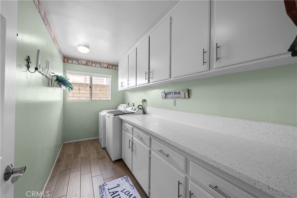 25514 Baker Place Stevenson Ranch, CA 91381 - Photo 22 of 36 Downstairs Laundry Room