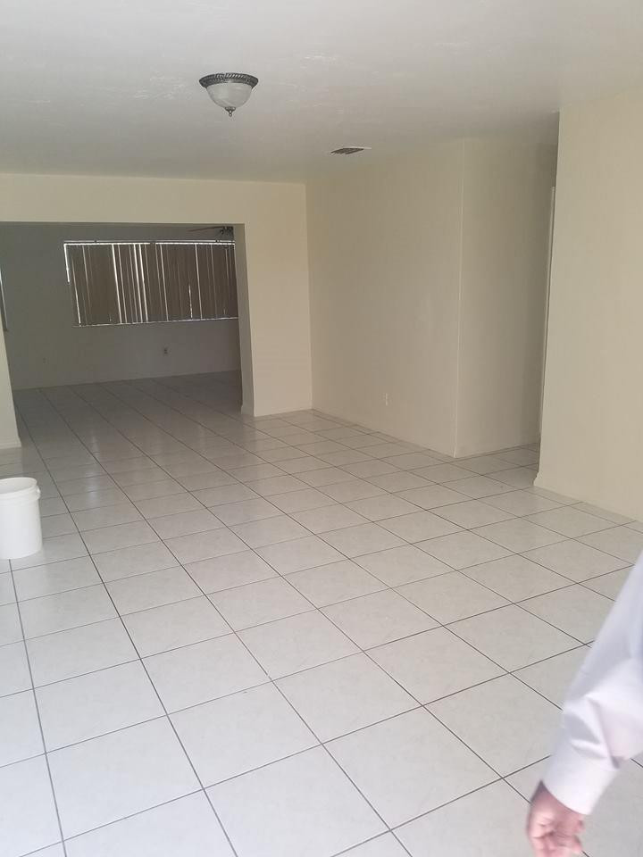 6830 Southwest 23rd Street Miramar, FL 33023 - Photo 11 of 17 a view of an empty room and chandelier fan