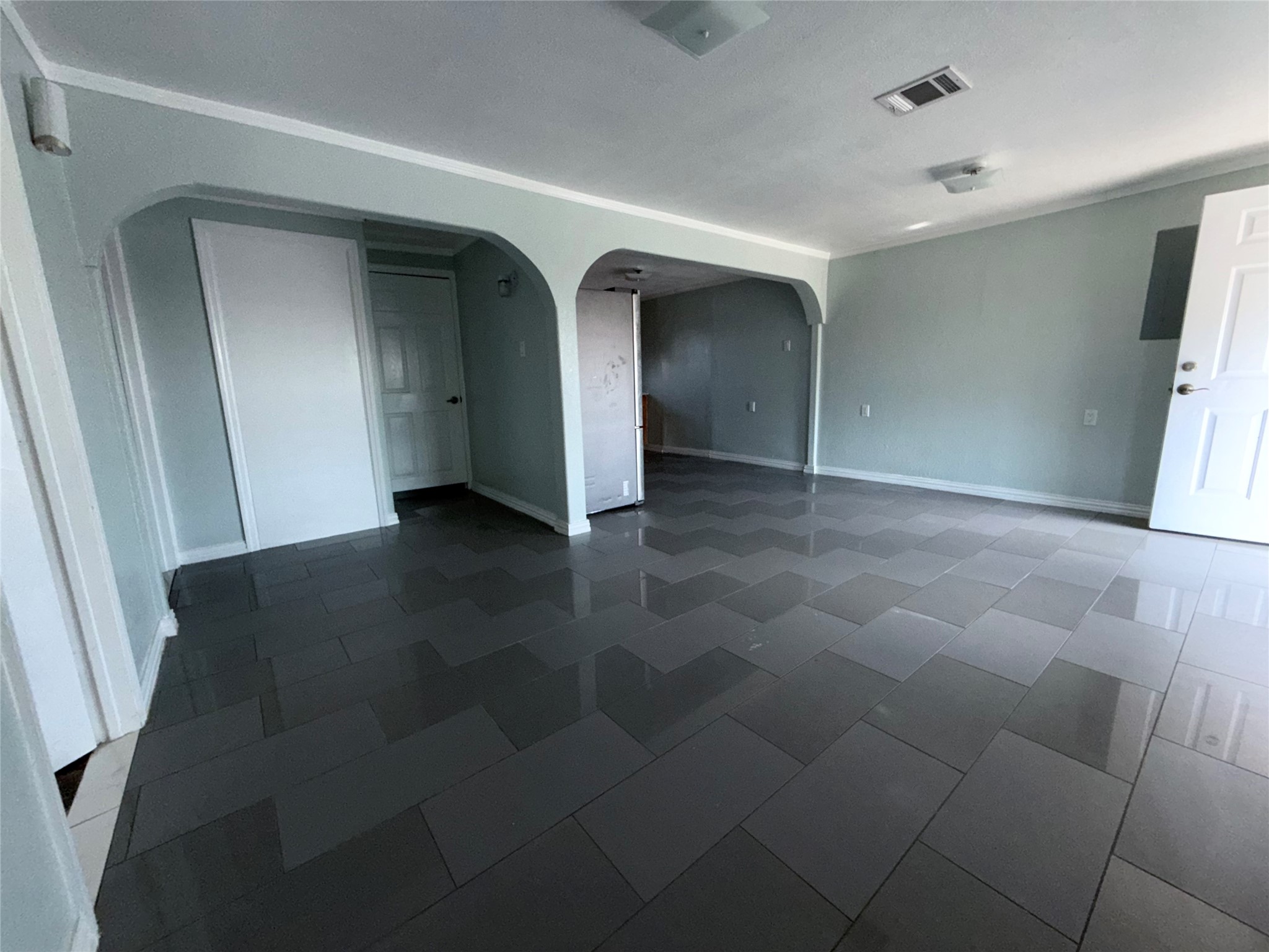 13809 Hershe Street, Unit B Houston, TX 77015 - Photo 4 of 9 a view of empty room with wooden floor