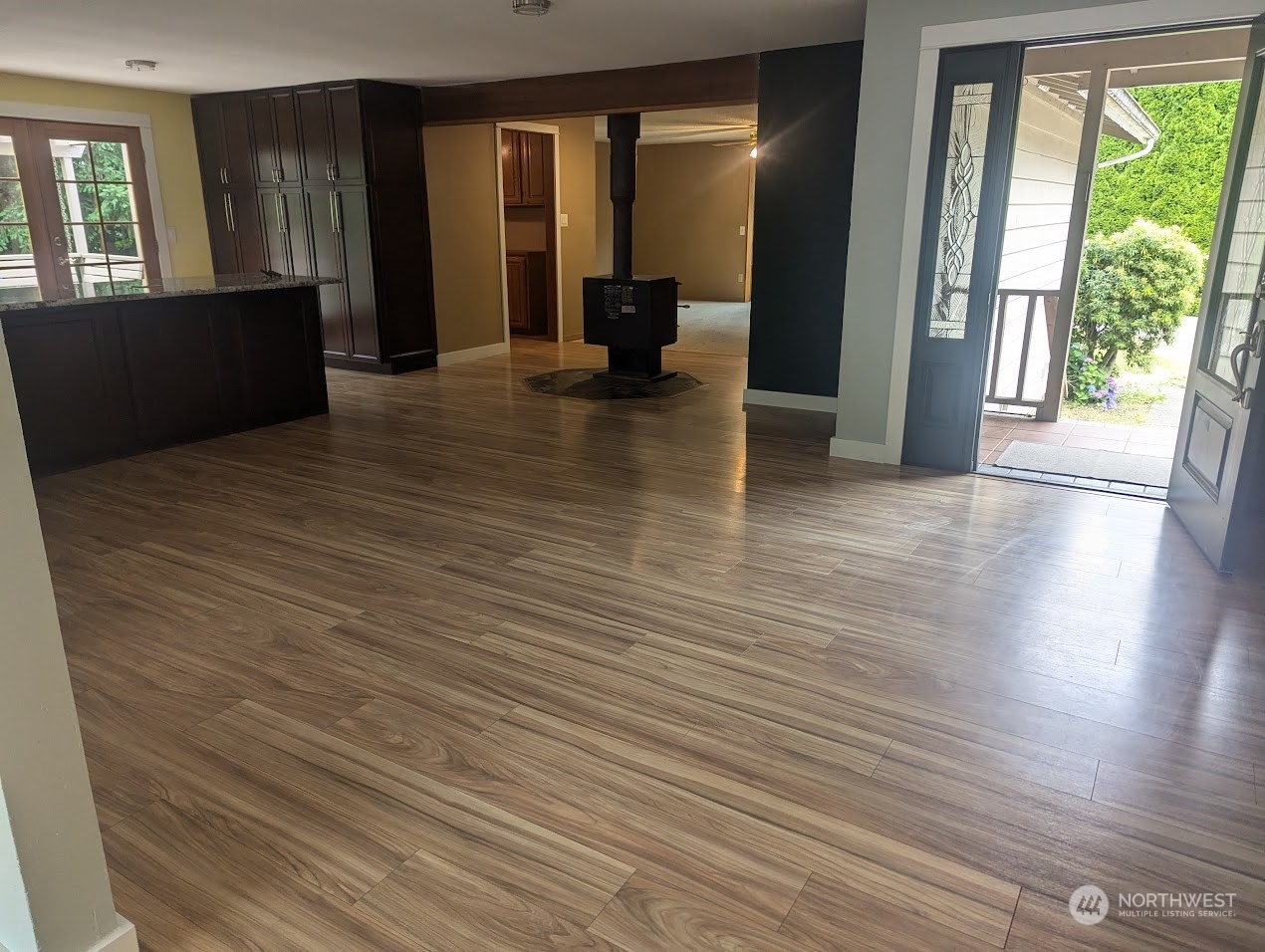 18429 Tualco Road Monroe, WA 98272 - Photo 4 of 5 a view of a hallway with wooden floor and windows