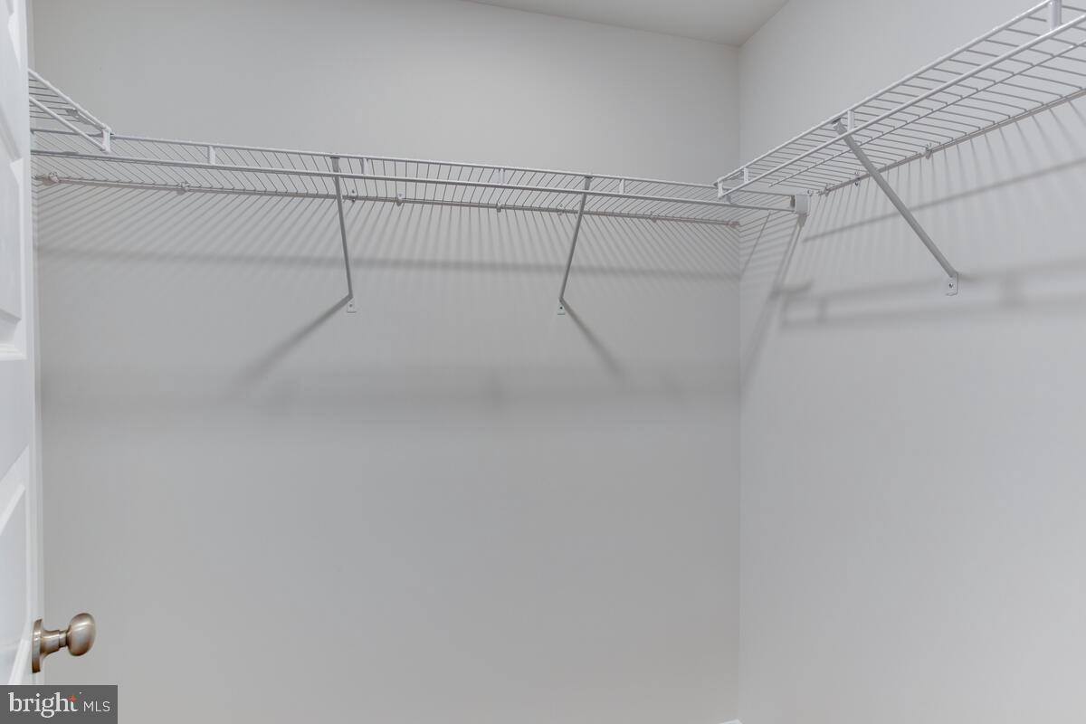 5814 Savannah Drive Brandywine, MD 20613 - Photo 30 of 49 a view of a room with racks on the wall