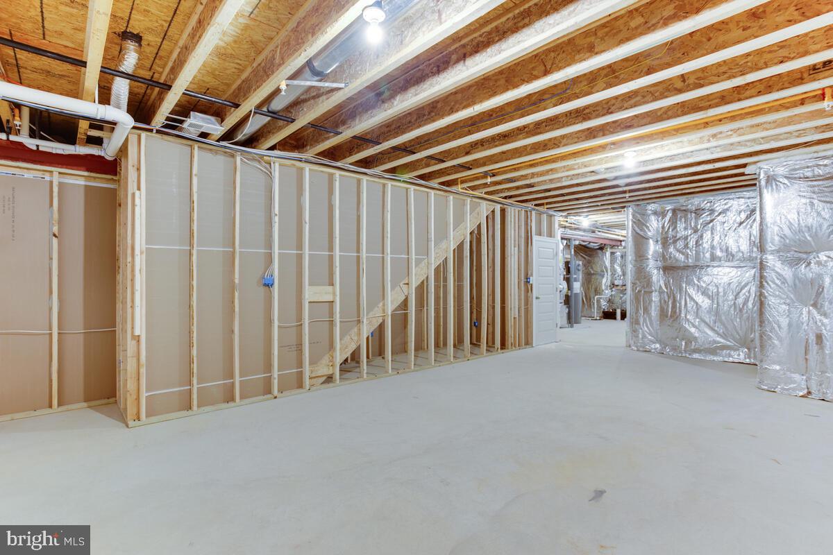 5814 Savannah Drive Brandywine, MD 20613 - Photo 40 of 49 a view of an empty room with wooden walls