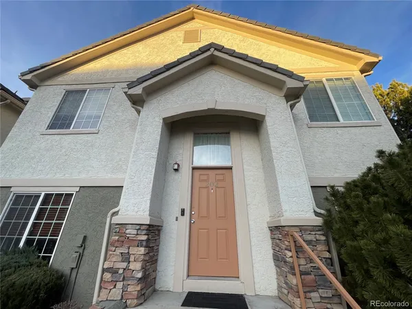 a front view of a house with a door