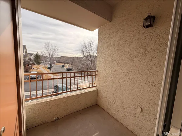 a view of a balcony with city view