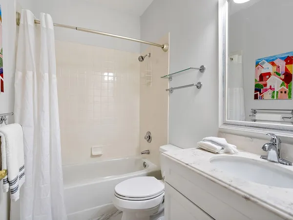 a bedroom with a bed furniture and a window
