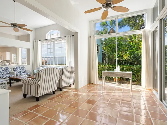a view of an entryway with floor to ceiling window