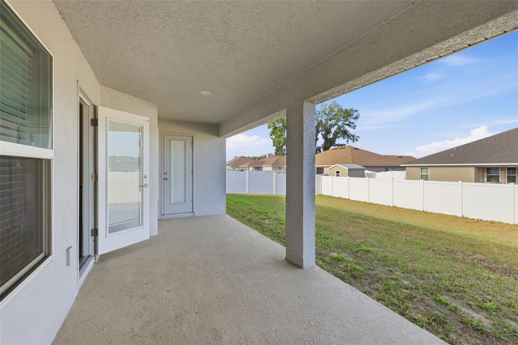 9144 Southeast 47th Court Road Ocala, FL 34480 - Photo 31 of 32 a view of a big room with an outdoor space and seating