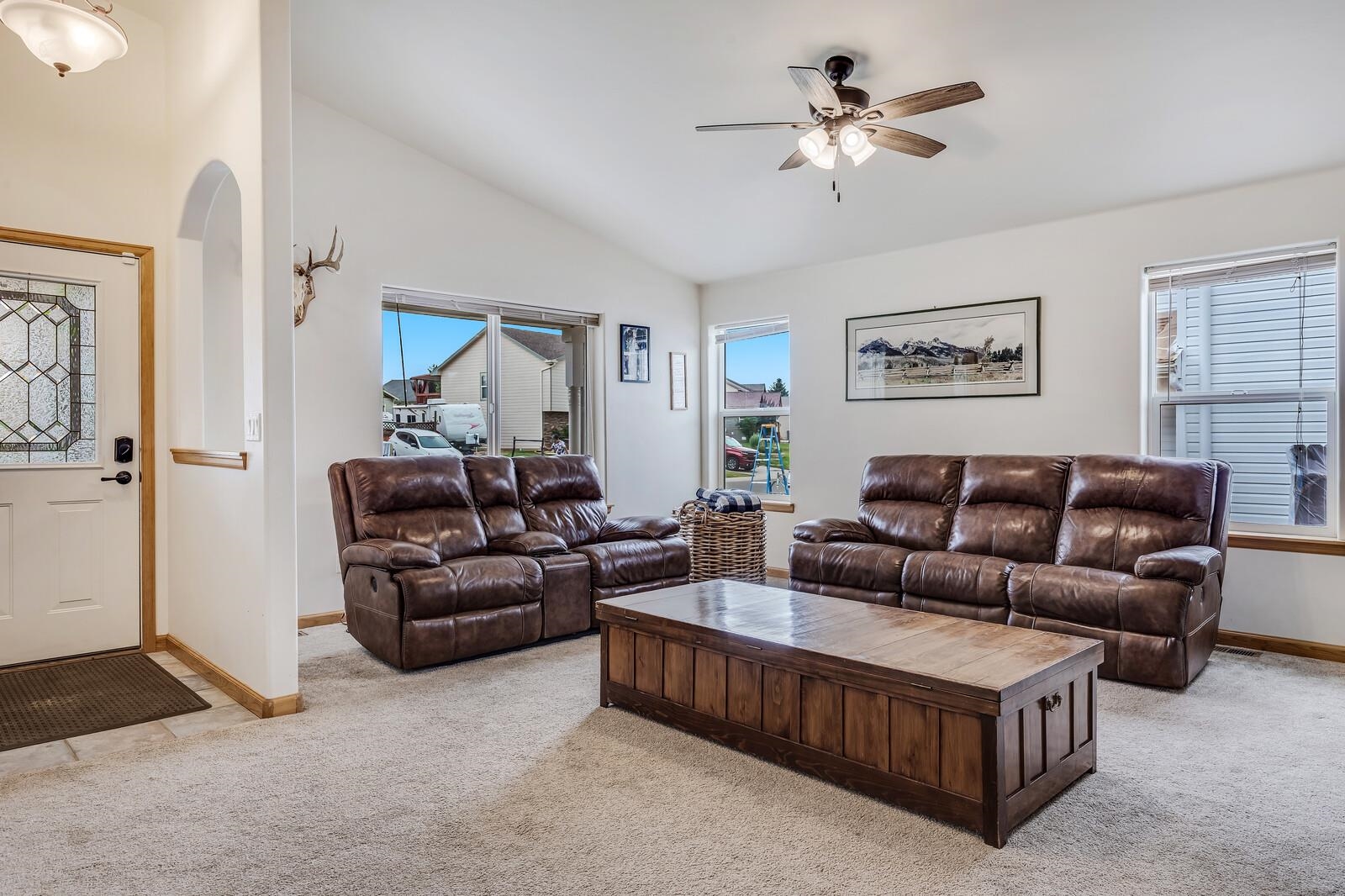1197 East 18th Way Rifle, CO 81650 - Photo 5 of 19 a living room with furniture and a ceiling fan