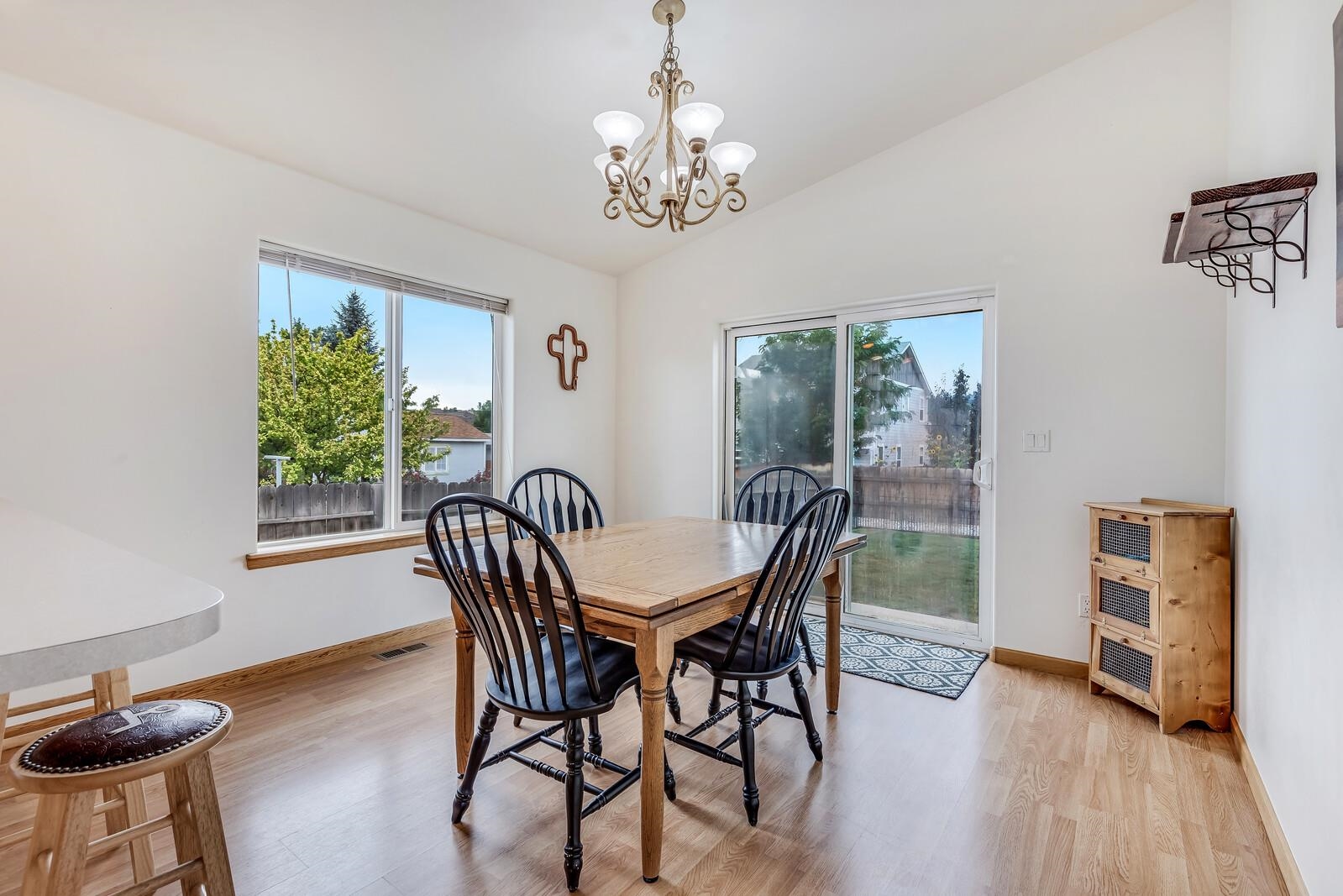1197 East 18th Way Rifle, CO 81650 - Photo 10 of 19 a view of a dining room with furniture window and wooden floor