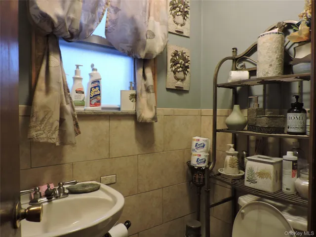 a bathroom with a sink and mirror