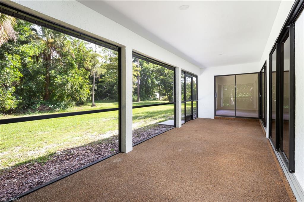 5671 Green Boulevard Naples, FL 34116 - Photo 32 of 37 a view of an ocean from a window