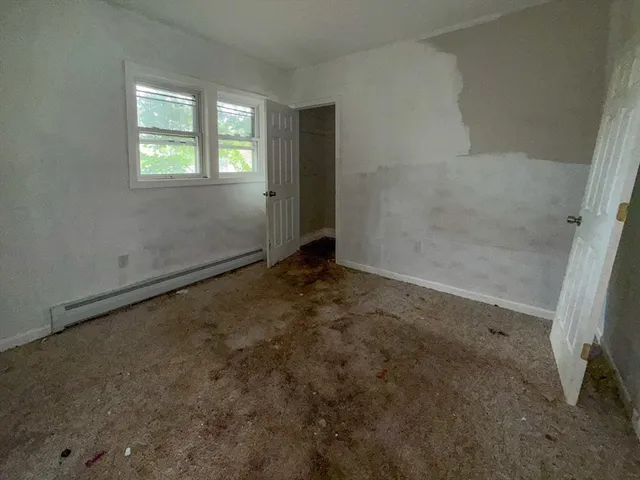 an empty room with windows