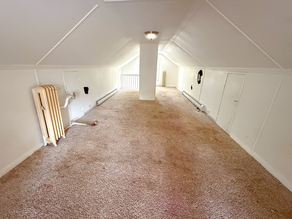 23 Eldert Street Springfield, MA 01109 - Photo 18 of 27 a view of a hallway with staircase