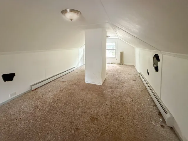 a view of a room with a hallway