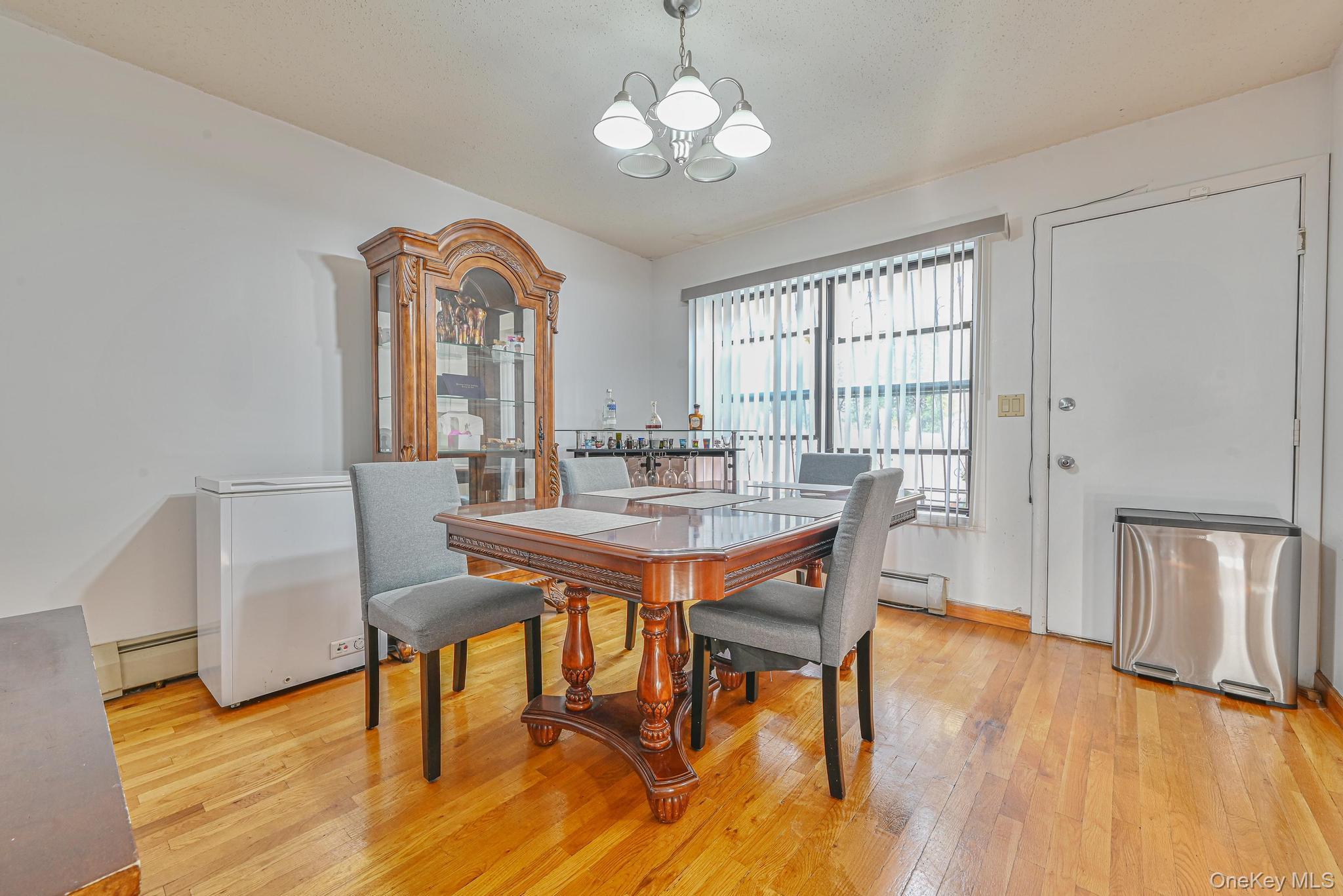 2087 Union Street Brooklyn, NY 11212 - Photo 6 of 20 a view of a dining room with furniture window and wooden floor