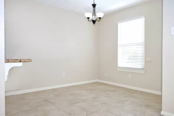 a view of a kitchen with a sink
