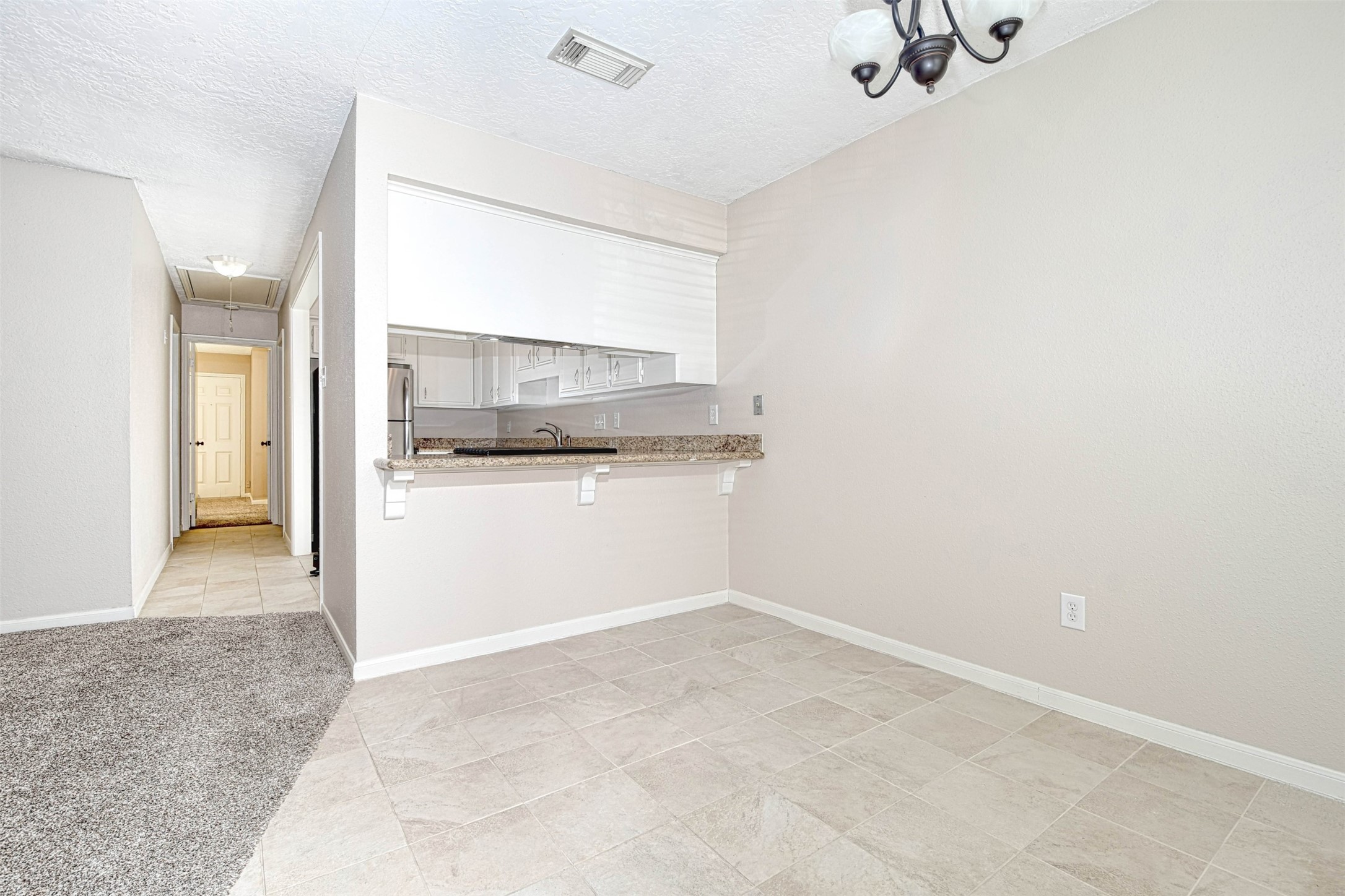 518 Moore Street Tomball, TX 77375 - Photo 7 of 18 The Tiled Dining area makes clean up easy!.