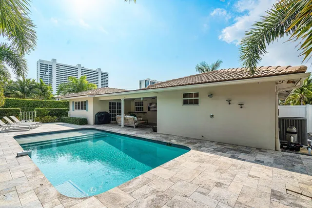 a view of a house with swimming pool