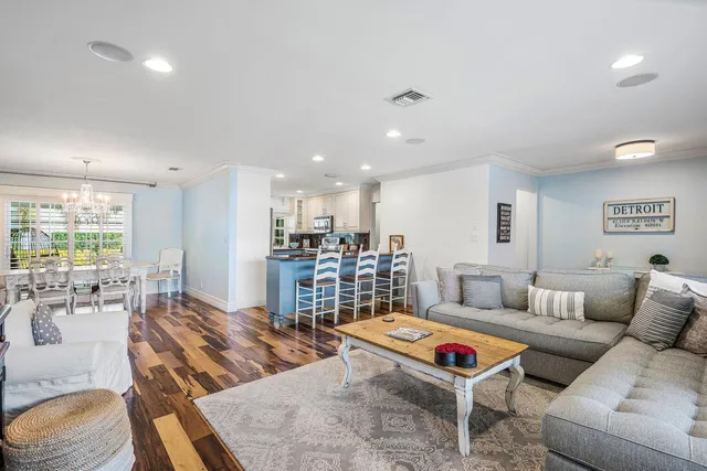 a living room with furniture and a table