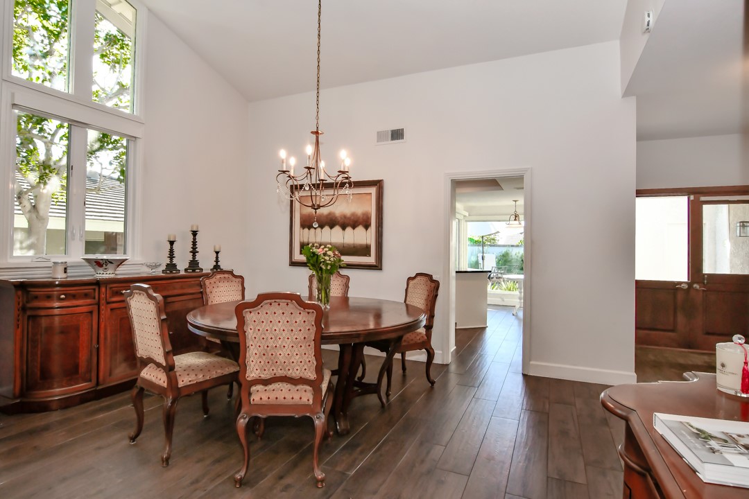 26 Shoal Drive Corona del Mar, CA 92625 - Photo 11 of 37 a view of a dining room with furniture window and wooden floor