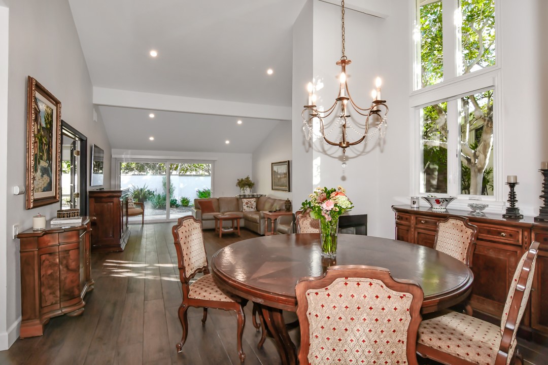 26 Shoal Drive Corona del Mar, CA 92625 - Photo 18 of 37 a very nice looking dining room with kitchen island furniture a large window and kitchen view