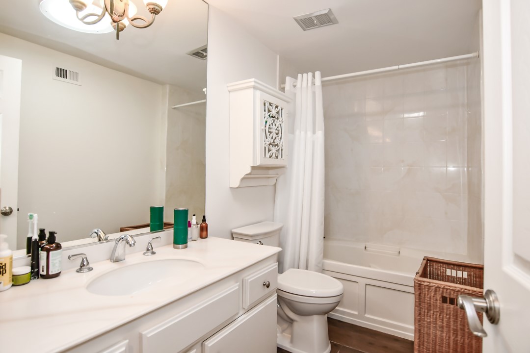 26 Shoal Drive Corona del Mar, CA 92625 - Photo 30 of 37 a bathroom with a sink toilet and shower