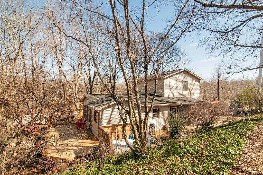 7214 Sleepy Hollow Road Fairview, TN 37062 - Photo 3 of 28 a view of a house with a yard