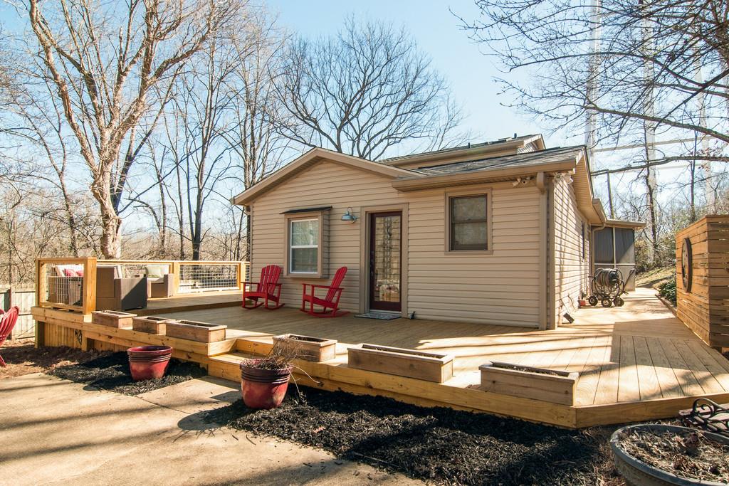 7214 Sleepy Hollow Road Fairview, TN 37062 - Photo 4 of 28 a view of backyard of house with outdoor seating