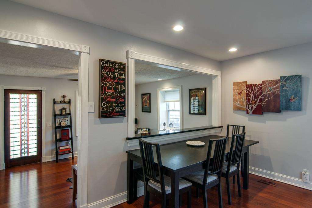 7214 Sleepy Hollow Road Fairview, TN 37062 - Photo 10 of 28 a view of a dining room with furniture and wooden floor