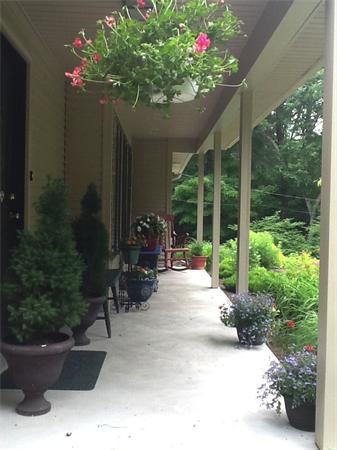 42 Old Stage Road Hatfield, MA 01088 - Photo 4 of 28 a view of backyard with plants and outdoor seating