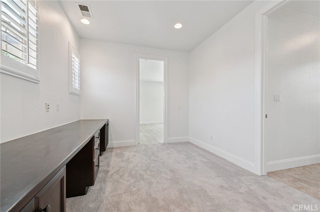 21 Canoe Irvine, CA 92618 - Photo 30 of 61 a room with a wooden floor and window