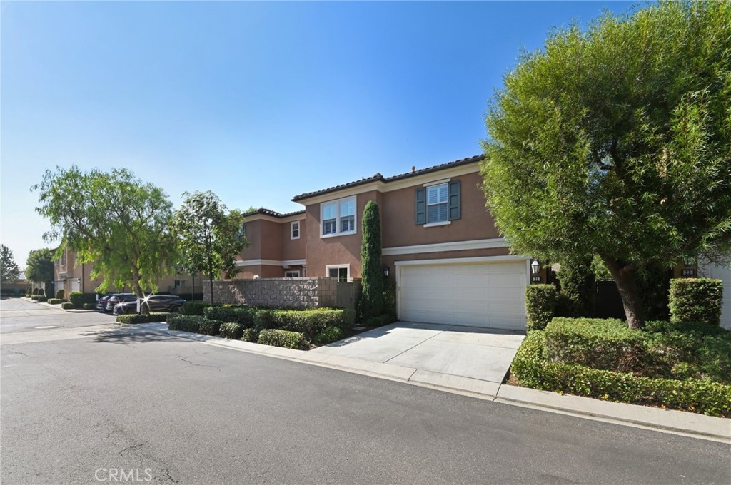 21 Canoe Irvine, CA 92618 - Photo 3 of 61 a front view of a house with a yard and garage