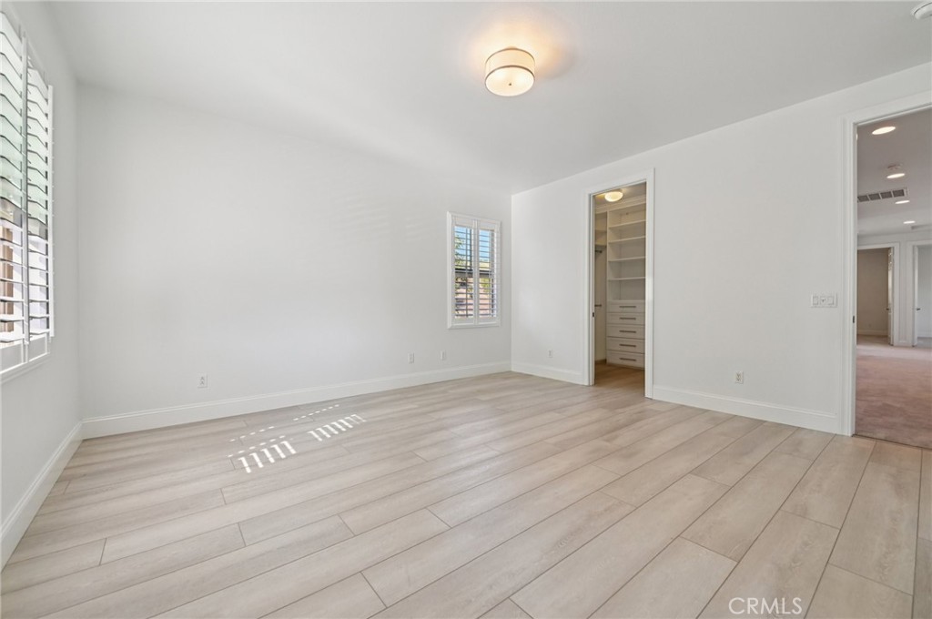 21 Canoe Irvine, CA 92618 - Photo 33 of 61 an empty room with wooden floor and windows