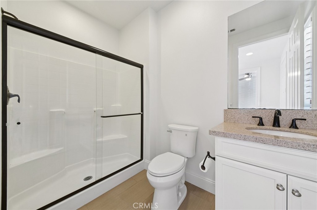 21 Canoe Irvine, CA 92618 - Photo 46 of 61 a bathroom with a granite countertop sink toilet and shower