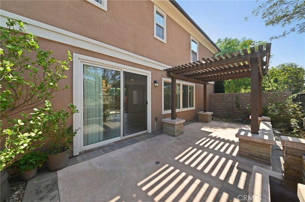 21 Canoe Irvine, CA 92618 - Photo 52 of 61 a view of a patio with table and chairs and potted plants
