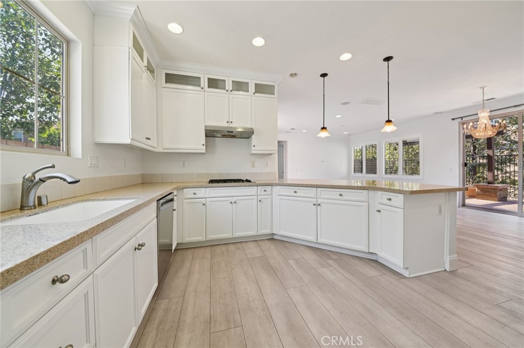 21 Canoe Irvine, CA 92618 - Photo 10 of 61 a kitchen with white cabinets appliances and a window