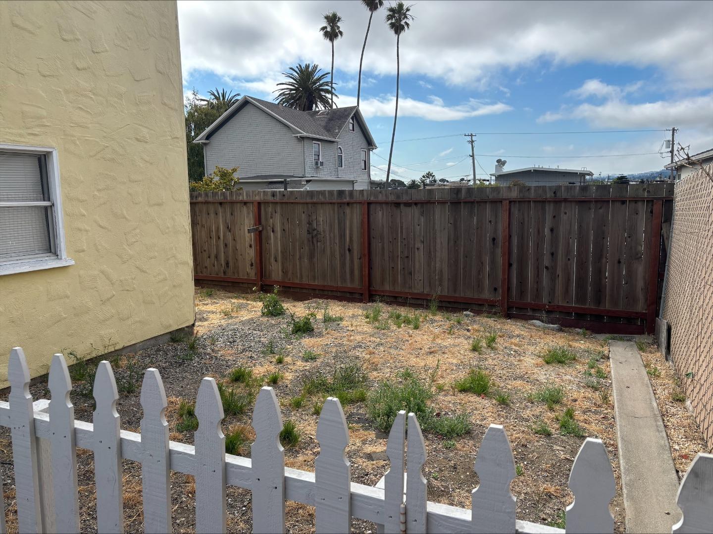 116 San Felipe Avenue San Bruno, CA 94066 - Photo 6 of 7 a view of wooden fence